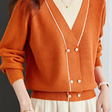 Contrast - color fake two - piece knitted sweater