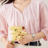 Solid color asymmetric button-up shirt