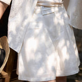 Double-button pleated casual shorts