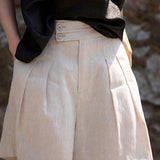 Double-button pleated casual shorts