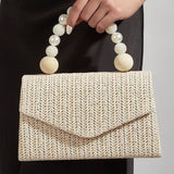 Woven beaded pearl handbag