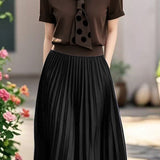 Elegant polka dot tie knit top and pleated skirt set