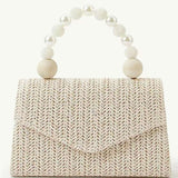 Woven beaded pearl handbag