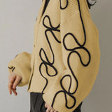 Loose V-neck knitted cardigan